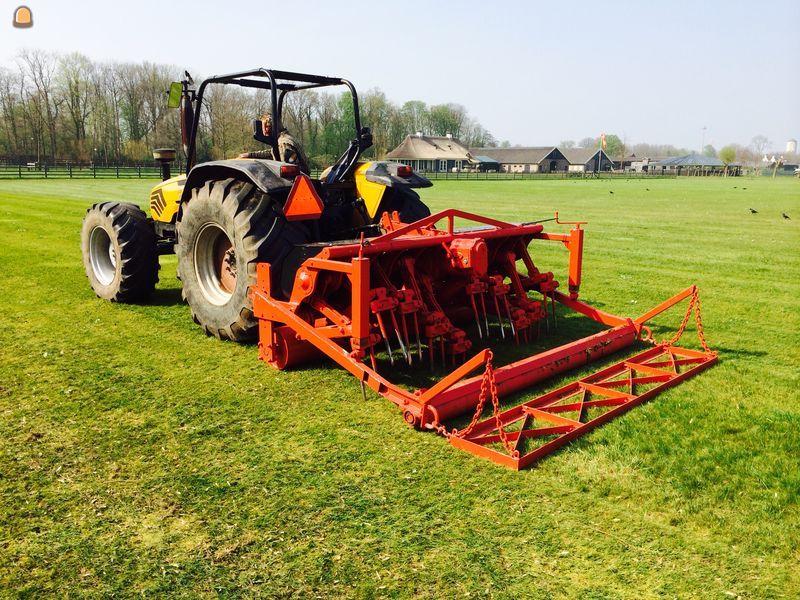 tractor verti drainmachine verticuteermachine huren vertidrain